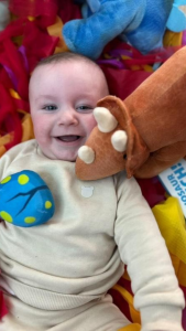 when do babies start smiling and laughing