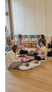 when do babies start playing with other babies?