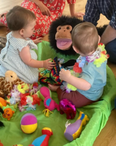 When do babies interact with each other 