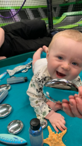 why does my baby copy me?