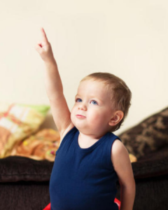when do babies start pointing and waving
