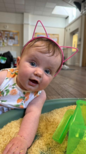 how to encourage my baby to reach and roll