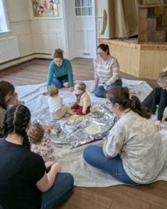 when do babies play with other babies