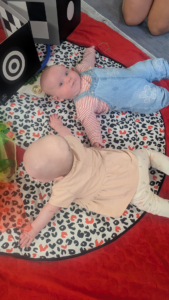 how to encourage my baby to reach and roll